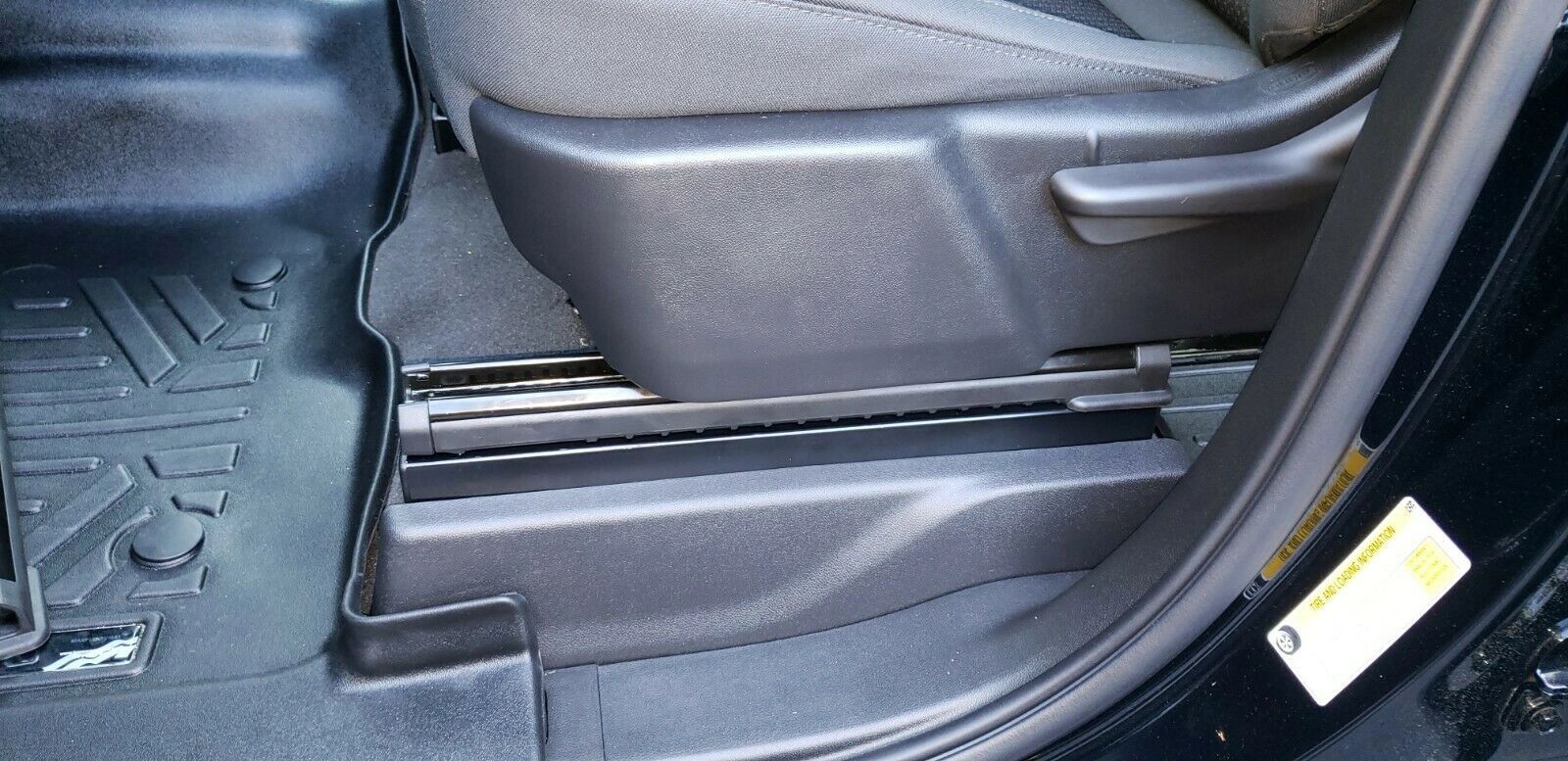 Chrome seat riser mechanism installed under truck seat